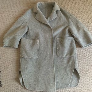 Sz M, Grey jacket. Studded pockets and 2 invisible buttons.